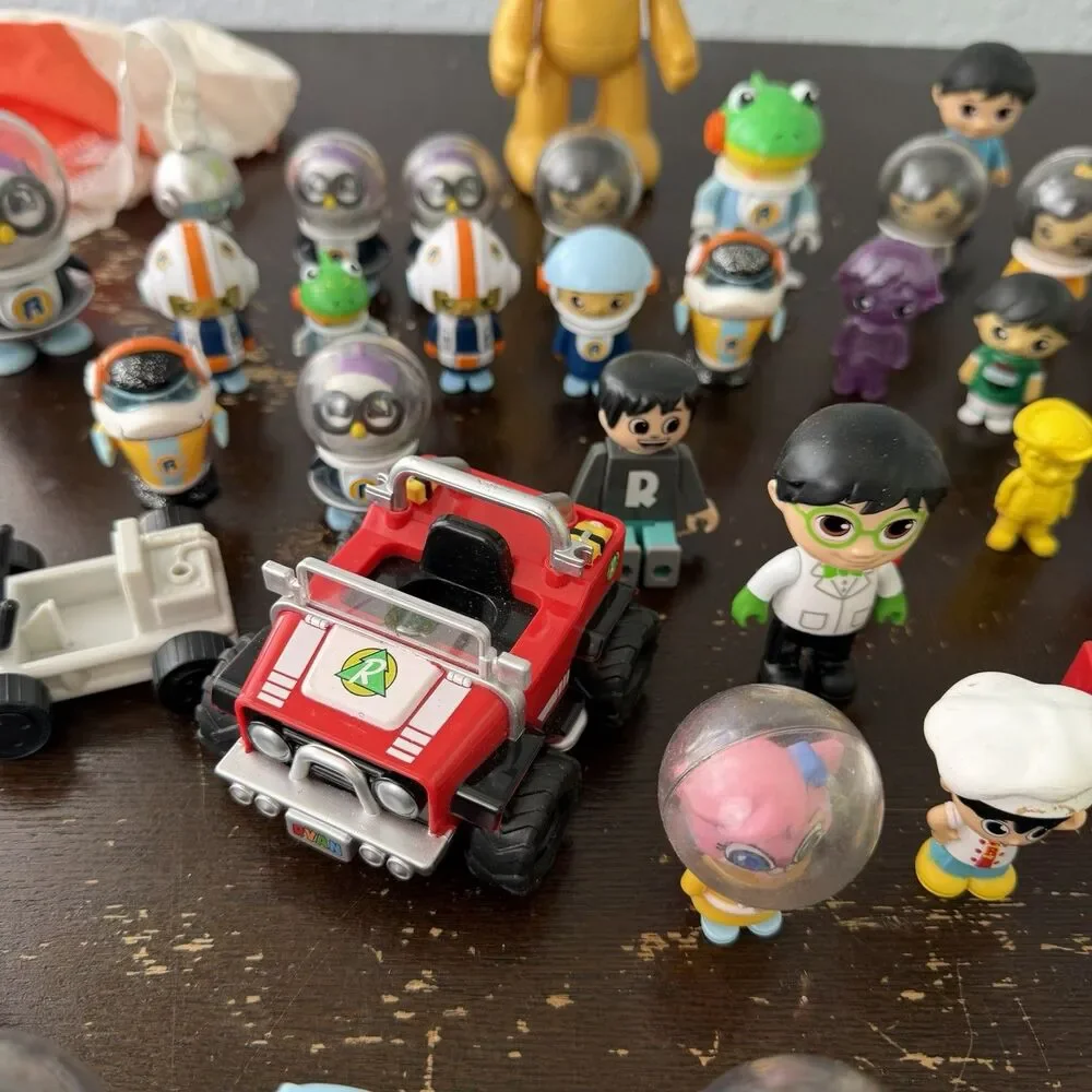 Ryan’s World Figures Lot 58 Pieces Red Titan Pandas Robots Helmet Astronauts